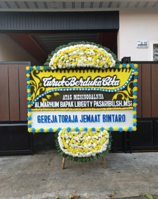 Papan Bunga Duka di Cikahuripan